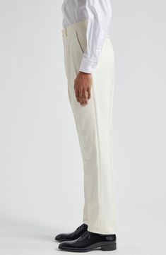 Tom Ford's contemporary elegance shines through in the masterful tailoring of resort-ready trousers crafted from fresh, luxurious silk. 37" inseam; 15" leg opening; 12" front rise; 17 1/2" back rise (size 48EU) Zip fly with hook-and-bar closure Front slant pockets Partially lined 100% silk Dry clean Made in Italy Designer Clothing Silk Tapered Leg Bottoms For Evening, Elegant Straight Silk Pants, Elegant Silk Straight Pants, Luxury Silk Trousers, Classic Wedding Trousers, Silk Full-length Bottoms For Wedding, Silk Bottoms With Pressed Crease For Evening, Elegant Silk Pants With Tapered Leg, Formal Wide-leg Silk Dress Pants