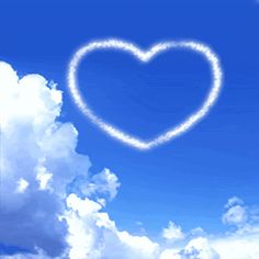 a heart shaped cloud floating in the sky