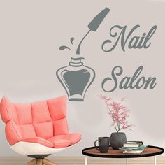 the nail salon wall decal is in grey and has an image of a bottle on it