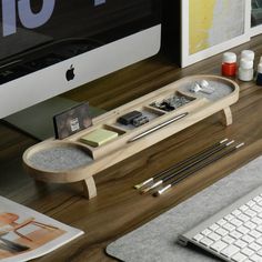 a computer desk with a keyboard and mouse