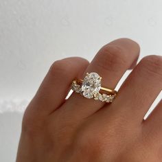 Elevate your love story with our stunning 2.50 CT Oval Cut Moissanite Engagement Ring Set, featuring a beautiful vintage hidden halo and a matching round marquise cut band crafted in luxurious 14kt gold. This exquisite Moissanite Engagement Ring Set radiates brilliance and timeless elegance, making it the perfect promise gift for your forever partner--make this symbol of your love a cherished centerpiece in their life today! ✥ Main Stone Details ✥ ↣ Shape: Oval Cut Moissanite Diamond ↣ Weight: 2.50 CT ↣ Size: 10.00 x 8.00 mm ↣ Side Stone Shape: Round Cut Moissanite Diamond ↣ Side Stone Weight: 0.25 CT ↣ Color/Clarity: Colorless/VVS ↣ Cut Grade: Excellent ↣ Ring Width: 1.60 mm ↣ Making Process: Handmade - Crafted by our experienced team ✥ Matching Band Details ✥ ↣ Shape: Round and Marquise Stone Wedding Ring, Moissanite Wedding Ring Set, Cute Engagement Rings, Future Engagement Rings, Wedding Rings Round, Custom Engagement Rings, Stone Wedding