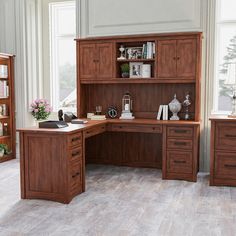 a wooden desk with two drawers and a book shelf in the corner next to it