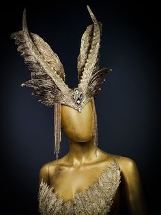 The unique headdress in gold and silver color, decorated with horns, a metal chain and rhinestones - a great choice for a photo shoot, a theme party, a gothic wedding, and also a great addition to costumes: Valkyrie, Queen of the Night, Vampire, Queen of Darkness, Angel.    The size of the product is adjustable using an elastic band that connects the sides of the headband. 100% designed and handmade by our designers ( SETA Design studio in Kyiv). It will be securely packed in a box. Feel free to Fantasy Crown Costume Accessories For Costume Party, Fantasy Costume Accessories For Cosplay Events, Gold Gothic Costume Accessories For Costume Party, Fantasy Headpieces For Costume Party And Cosplay Events, Gothic Gold Costume Accessories For Costume Party, Fantasy Tall Crown Costume Accessories For Costume Party, Fantasy Tall Crown For Costume Party, Medieval Costumes For Party And Cosplay Events, Gold Halloween Party Costume