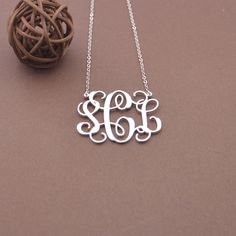 "925 sterling silver monogram necklace-monogram initials necklace-any initials-Personalized monogrammed gift Personalized monogram Necklace is 100% handcrafted - Made of 925 Sterling Silver,This initials necklace is a unique gift for a loved one,best friend or book lover for any occasions. Your purchase will arrive inside a lovely gift box ready for gift giving. Product Description Metal: High Quality 925 Sterling Silver Pendant Size:1\",1.25\",1.5\",2\"(optional) Color: silver, gold, rose gold One Best Friend, Initials Necklace, Silver Monogram, Monogram Jewelry, Buy Necklace, Rose Gold Chain, Monogram Necklace, Personalized Monogram, Monogram Initials