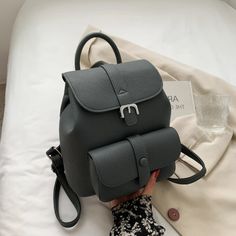 • Main Material: PU• Clasp Type: STRING• Carrying system: arched shoulder strap• Interior: cell phone pocket• Import Product Small Leather Backpack, Brand Collaboration, Black Leather Backpack, Global Brands, Women's Bags, Leather Backpack, Fashion Backpack, Blue Grey, Cell Phone