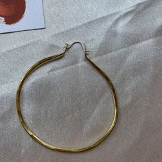 These big mommas are 2.5 inches. They are hand formed from brass wire with a sterling silver hook that goes through your ear. These beauties are my take on a classic hoop that you will wear for years to come!! Artisan Earrings, Paper Crane, Mixed Metals, Earring Backs, Brass, Sterling Silver, Silver