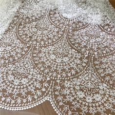 Beautiful Embroidery flower lace fabric This is a new style in high quality. Great for wedding dress, evening gown, Costume, cocktail dress This Listing is sell for fabric, not include the dresses Color: off white Width - 51 inches, Length- yard Wholesale acceptable, please convo me Shipping Time: United Sates: 10-15 working days United Kingdom:10-15 working days Canada: 10-15working days Australia: 10-15 working days Asia:4-8 working days Europe: 10-20 working days need express mail service , p Cream Lace Fabric With Embroidered Lace Patchwork, White Scalloped Lace Embroidered Fabric, White Embroidered Lace Fabric, White Lace Embroidered Fabric, Lace Embroidered Fabric With Lace Trim For Wedding, Wedding Embroidered Lace Fabric With Lace Trim, White Lace Wedding Dress With Floral Embroidery, White Lace Wedding Dress With Intricate Embroidery, White Lace Wedding Dress With Lace Patchwork