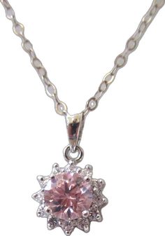 Dazzling Sparkling Pink Jewelry, Dazzling Pink Crystal Necklace, Dazzling Pink Crystal Necklaces, Pink Crystal Jewelry With Diamond Accents, Pink Cubic Zirconia Round Pendant, Dazzling Pink Necklaces With Sparkling Stones, Pink Cubic Zirconia Round Pendant Jewelry, Pink Necklaces With Prong Setting For Gifts, Pink Sterling Silver Necklace With Diamond Accents