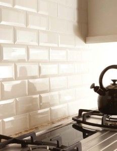 a tea kettle sitting on top of a stove