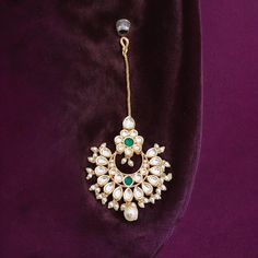 Kundan Stone Maang ka Tikka  It comes in Gold Plated with a hook at the end Please Refer to the image for the length. If you have any other questions, feel free to contact us. Check out our other listings at: https://www.etsy.com/shop/mdbeadworks JEWELLERY CARE Protect your Jewellery from Sharp Blows, Scratches, and Extreme Temperatures. Avoid Contact With Perfumes, Sprays, Chemicals, and Water. Keep your Jewellery in a Clean, Dry, and Airtight Box. Wipe it using a Soft Cloth Regularly. Thanks f Gold Tikka With Stone Work Gift, Luxury Gold Tikka With Stone Work, Traditional Heavy Gold Tikka, Eid Kundan Tikka Temple Jewelry, Antique Maang Tikka Gold, Pakistani Jewelry, Pakistan, Jewelry Care, Jewelry Sets