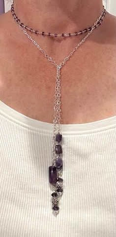 Amethyst and sterling silver featured in this lariat style handcrafted necklace. Approximately 43 inches in length.  Length shortens considerably when wrapped around neck to an adjustable size. Adjustable Sterling Silver Lariat Necklace - Spiritual, Sterling Silver Multi-strand Jewelry With Adjustable Chain, Adjustable Sterling Silver Lariat Necklace For Spiritual Style, Artisan Silver Jewelry With Adjustable Length, Adjustable Silver Artisan Lariat Necklace, Artisan Silver Double Strand Jewelry, Handmade Artisan Silver Lariat Necklace, Artisan Handmade Silver Lariat Necklace, Spiritual Lariat Necklace With Adjustable Chain