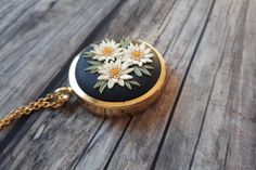 Mothers Day Locket Necklace, Mothers Day Gift, Mothers Day Keepsake FREE FEDEX priority shipping takes: 2-3 WORKDAYS ( USA). This is a vintage style, unique, handmade, polymer clay locket necklace with edelweiss flowers motif. This beautiful romantic, photo locket necklace is a piece of original and unique artwork. It's a perfect gift idea for mom, for wife. The base of the locket is gold color, brass alloy. The photo locket is openable, you can insert a picture or some small souvenir from your Vintage Flower Charm Necklace For Gift, Vintage Charm Flower Pendant Jewelry Gift, Vintage Flower Pendant Jewelry As Gift, Vintage Charm Jewelry With Flower Pendant For Gift, Flower Shaped Necklace With Vintage Charm As Gift, Flower Shaped Necklace With Vintage Charm For Gift, Handmade Antique Jewelry Gift, Handmade Vintage Jewelry For Anniversary, Vintage Charm Locket Necklace With Flower Pendant For Gift