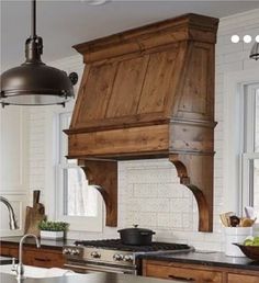 a kitchen with wooden cabinets and an oven