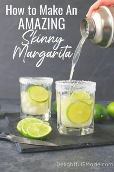 a person pouring water into two glasses filled with limeade