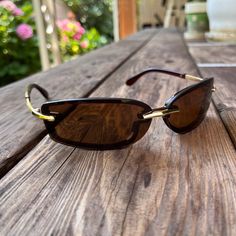 Vintage retro 90s style brown wrap around lens sunglasses 😎  Summer is here y'all, time to bring out the sunnies! UV400 All sunglasses come with a sunglass holder/case and microfiber cloth :) Color: Gold/Brown frames, Brown lenses Style: y2k, 90s, pop, cutie patoot, rave, cateye, oval Next Day Shipping Guaranteed! Retro Brown Shield Sunglasses With Polarized Lenses, Retro Brown Adjustable Sunglasses, Trendy Brown Sunglasses For Outdoor, Trendy Brown Outdoor Sunglasses, Casual Brown Shield Sunglasses With Uv Protection, Casual Brown Shield Sunglasses For Outdoor, Casual Brown Rectangular Shield Sunglasses, Brown Rectangular Shield Sunglasses With Uv Protection, Brown Rectangular Shield Sunglasses With Uva Protection