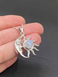 "Sterling Silver Moon and Sun Moonstone Necklace Metal: All components are made from solid .925 Sterling Silver Stone: moonstone gemstone Measurement: pendant height is approx. 35mm (1.4\")  and 25mm (1\") wide  Choose Chain Length At Checkout  Please feel free to Convo me with any questions before purchasing.  Please view policy before purchasing You can enter my storefront here https://www.etsy.com/shop/LinksAndStones Thank You For Visiting My Shop" Celestial Silver Necklace With Gemstone, Celestial Silver Gemstone Necklace, White Moonstone Jewelry With Moon Charm, Moonstone Pendant With Sun And Moon Design, Moonstone Pendant Jewelry With Sun And Moon Design, Moonstone Sun And Moon Pendant Jewelry, Celestial Moon Shaped Birthstone Jewelry, Celestial Moon-shaped Birthstone Jewelry, White Pendant Jewelry With Sun And Moon Design