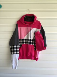 Handmade patchwork hoodie. Love this color combination! Fits size Xs-L Patch Work Blanket Hoodie, Cheap Patchwork Sweatshirt For Women, Pink Hooded Hoodie With Patchwork, Red Patchwork Hooded Hoodie, Pink Patchwork Hoodie, Pink Patchwork Hoodie For Winter, Pink Patchwork Hoodie For Fall, Red Patchwork Long Sleeve Hoodie, Red Long Sleeve Hoodie With Patchwork