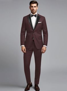 Make your presence felt in style with this wine tuxedo suit offering style and sophistication effortlessly with sleek style. Crafted from wool blend, the tuxedo suit is a trending essential you will surely need to pump up your elegant style personality.  Featuring satin lapel, matching satin covered buttons and gentle texture at its surface, our tuxedo is a subtle fashion-forward take on a traditional tailoring.  Look Includes   Napolean Wine Wool Fabric  Two Button Tuxedo Jacket Style  Notch Lapel  Black Tuxedo Buttons  Single Vent  Three Cuff Buttons  Two Welted Back Pockets on Trousers   Click 'Customize Now' to modify the look if needed.  Jacket is fully lined while the Pants do not have satin lining.  Lining: Viscose; Dry Clean. Groomsmen Attire No Jacket, Wine Tuxedo, Subtle Fashion, Grey Wool Suit, Blue Linen Shirt, Burgundy Tuxedo, Brown Corduroy Jacket, Dress Suits For Men, Cashmere Jacket