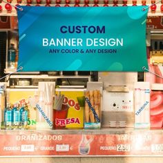 a sign that says custom banner design any color and any design in front of a food stand