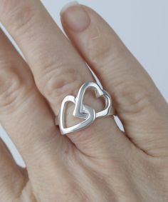 Heart to Heart Silver Ring, 923 Sterling Silver Eternal Love Heart to Heart High Polish Ring, Jewelry Gift Boxed for Her, Valentine's Day Gift for Her Ring Face Length: 0.50 inches Width: 0.80 inches High Polish Nickel Free Comes with a free gift pouch & box Free Shipping It is solid and comfortable to wear. It is oxidized and polished. Exclusive high Quality. We free ship in the US, and accept 30 days return for not used and or abused jewelry. It is Made in our 20 years old workshop. Adjustable Heart Ring For Valentine's Day Anniversary, Double Heart Ring For Valentine's Day, Sterling Silver Heart Ring For Valentine's Day, Personalized Silver Heart Ring For Valentine's Day, Heart Charm Ring For Anniversary And Mother's Day, Heart-shaped Hallmark Ring For Anniversary, Heart Cut Ring For Valentine's Day Gift, Heart-shaped Anniversary Ring With Hallmark, Valentine's Day Heart Cut Ring With Heart Charm