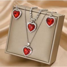 Thanks For Stopping By! While You're Here Please Take A Look At The Other Items In My Shop. Bundle And Save! About This Item: Red Glass Heart Necklace (18") Bracelet (Adjustable 8-10") Earrings Set Rhinestone Surround Silver Tone, Jewelry Box Not Included Thank You For Looking! Condition: New With Tags Crystal Jewelry Sets For Anniversary On Valentine's Day, Crystal Jewelry Sets For Anniversary And Valentine's Day, Valentine's Day Crystal Jewelry Sets Gift, Valentine's Day Heart Cut Crystal Jewelry, Crystal Jewelry With Heart Charm For Valentine's Day, Heart-shaped Cubic Zirconia Jewelry Sets For Valentine's Day, Valentine's Day Crystal Jewelry With Heart Charm, Heart-shaped Crystal Jewelry For Valentine's Day, Valentine's Day Heart-shaped Crystal Jewelry