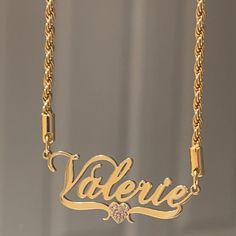 crafted from 18K Gold Plated Stainless Steel for a gleam so bright, you'll be saying "who dat!?". Tarnish resistant and hypoallergenic, this extra special nameplate is graced with an iced out heart consisting of AAA CZ stones for a touch of extra sparkle. Get your name in lights (or at least in shimmery stones!) today! 18k Gold Plated Stainless Steel Tarnish Resistant Nickel and Lead Free Hypoallergenic ******To avoid stones from falling and to maintain the longevity of the necklace we suggest t Luxury Personalized Gold Charm Necklace, Cheap Birthstone Name Necklace For Birthday, Luxury Nameplate Necklace For Anniversary, Luxury Silver Heart Anniversary Necklace, Luxury Personalized Charm Necklaces As Gift, Luxury Nameplate Name Necklace For Gift, Cheap Personalized Red Necklaces, Luxury Nameplate Necklace As A Gift, Cheap Metal Nameplate Jewelry