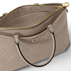 LOUIS VUITTON® - Trianon Mm - Turtledove Sac Louis Vuitton, Louis Vuitton Sac, Louis Vuitton Official, Monogrammed Leather, The Grey, Leather Top, Luxury Handbags, Cowhide Leather, Tote Handbags