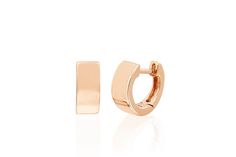 Our gold jumbo huggie earring is comprised of 14k solid gold. Huggie height measures: 9mm Inner huggie diameter: 7.5mm Huggie thickness: 4mm Solid as a pair Gold-tone Huggie Earrings, Luxury Gold-tone Huggie Jewelry, Elegant Gold-tone Huggie Earrings With Polished Finish, Luxury Gold-tone Huggie Earrings, Elegant Gold-tone Huggie Earrings In Brass, Statement Engagement Ring, Gold Bubbles, Diamond Signet Ring, Personalized Rings