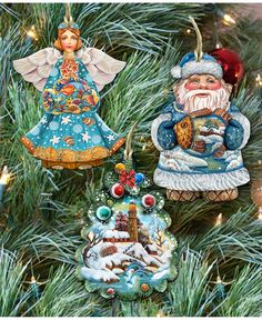 three ornaments hanging from a christmas tree