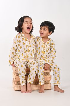 Everyone's Favourite Fruit now in a Print! Discover the perfect blend of comfort and style with our premium UNISEX Matching Nightsuit sets . Crafted from high-quality fabrics, our kurtas provide ultimate softness and breathability for your little one's delicate skin. * Product Name - Mango Print  Night Suit *Material - Mulmul 100% Cotton. * Uses and Purpose - Nightwear  * Sizes  - 9-12 months , 1-2 yrs, 2-3 yrs, 3-4 yrs, 4-5 yrs. * Wash Care - Gentle hand wash or quick cycle machine wash in cold Printed White Sleepover Sets, White Printed Sleepover Sets, Matching White Loungewear Sets, Festive Family Matching Cotton Sets, Matching White Sets For Sleepover, Playful Matching Sets For Sleepover, Yellow Printed Sets For Loungewear, White Family Matching Bedtime Sets, Playful Matching Bedtime Set