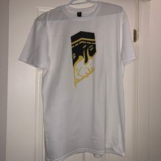 Islamic Kaaba t-shirt comes in many sizes White Graphic Tee With Front And Back Print, Casual White Shirt With Front And Back Print, Casual White Shirt With Print, White Short Sleeve Top With Print, White Short Sleeve Top With Front And Back Print, White Crew Neck T-shirt With Front Print, White Fan Apparel T-shirt For Streetwear, White T-shirt With Front And Back Print For Fans, White Crew Neck Shirt Fan Apparel