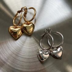 "-Our best-selling pair of lightweight metal Heart-shaped Earrings that are perfect for everyday wear -Sold a pair -Pendant diameter：2 cm（0.78\"） -Each hoop weighs 5 grams  -Made from plated brass -Plating is 0.3 microns + e-coating for long lasting durability -Posts are made from surgical steel so they are very hypo-allergenic for sensitive ears -Earrings are 100% nickel-free and cadmium-free -Available in Silver and  Gold  Dimensions * 3.6 cm length" Sensitive Ears Earrings, Gold Heart Earring, Y2k Jewelry, Silver Heart Earrings, Heart Hoop Earrings, Ear Earrings, Earrings Heart, Heart Dangle Earrings, Heart Shaped Earrings