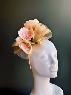 elegant magnolia or orchid flower fascinator headpiece, perfect for tea parties, derby events, and other special occasions!  Thank you for supporting small businesses and we hope our products bring you and your loved ones Joy & Happiness! S H I P P I N G  -   Last minute masquerade mask shopping? 24 hr processing available. Pick appropriate shipping method and leave us checkout note! 1-2 day guaranteed delivery services also offered, add items to cart and click on shipping tab for rates.  Pls leave a check out note with your need date & contact number (especially for expedited and custom orders) Msg for delivery time frames (Include your state/country). S I Z E Adult size. Detailed dimensions are available upon request. C O N T A C T Text: 1-516-654-4643 Email: Lanai.ink6 [!at] gmail.com W Elegant Spring Fascinator With Matching Headband, Flower-shaped Party Fascinator With Flower Decoration, Summer Flower Fascinator, Garden Party Flower Hat With Handmade Flowers, Summer Party Flower Headband, Elegant Hats With Matching Headband For Kentucky Derby, Spring Fitted Headband Hair Accessories, Fitted Spring Headband, Headband For Garden Party At Royal Ascot