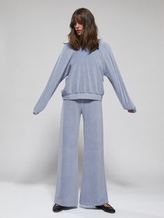 A relaxed fit, perfect for travel. Silhouette-draping form and design, generous fit, and softly ribbed comfy sleeves. | Suzie Kondi Samos Oversized Sweatshirt in Velour | Chambray | Women's X-Small Solid Color Relaxed Sweats For Loungewear, Relaxed Solid Color Sweats For Loungewear, Relaxed Sweats For Loungewear, Relaxed Fit Athleisure Sweatshirt For Relaxation, Comfy Relaxed Fit Sweatshirt For Relaxation, Athleisure Relaxed Fit Sweatshirt For Relaxation, Comfy Sweats With Soft Texture And Relaxed Fit, Relaxed Cozy Fit Tops For Loungewear, Oversized Blue Sweats For Loungewear