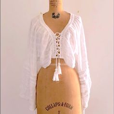 [Free People] White Lace Tassel Balloon Sleeves Cropped Oversized Blouse Top. Like New, The Seams Apart Lace Parts(Last Picture) No Care Labels Long Sleeve Fringe Tops For Summer, Long Sleeve Fringe Tops For Festivals, White Cotton Top With Back Tassel Tie-up, Long Sleeve Fringe Top For Vacation, Casual Vacation Blouse With Fringe, Bohemian Fringe Blouse For Vacation, Bohemian Blouse With Fringe For Vacation, Casual Fringe Blouse For Vacation, Summer Long Sleeve Tops With Tassel Ties