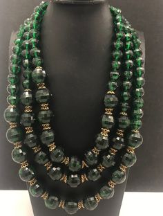 Chunky Green Necklace, Huge Lucite Rhinestone Necklace, 3 Strand Necklace, 1960's Vintage Jewelry Style: 1960's Glam Huge green rhinestone clasp Color: gold tone metal, green stones Size: 20 inches long  Condition: Very good vintage condition Approximate Date: 1960's Hallmarks/signature: None For more vintage necklaces.... http://etsy.me/1RY2UxM For more jewelry & collectibles.... www.etsy.com/shop/MartiniMermaid d96 Luxury Green Beaded Necklaces For Party, Luxury Formal Rondelle Beaded Necklaces, Luxury Green Beaded Necklace For Parties, Luxury Tarnish Resistant Green Necklace, Luxury Vintage Necklaces With Large Beads, Luxury Green Beaded Necklaces For Celebration, Luxury Green Beaded Necklace With Large Beads, Luxury Green Large Beads Jewelry, Luxury Green Beaded Necklaces As Gifts