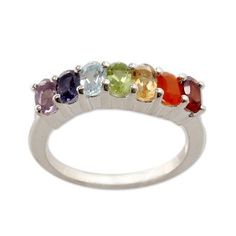 Colorful gems of powerful beauty are designed to align with their respective chakras in a ring from Alok Jain. Crafted of sterling silver the ring is crowned with amethyst iolite citrine peridot garnet quartz and carnelian set within a gentle curve. Their colors correspond to a specific chakra for clear and light purple stones are associated with the 7th chakra (awareness and wisdom); the purple violet and indigo gems with the 6th chakra (insight and perception) and the blue or light blue with t Spiritual Multi-stone Oval Rings, Spiritual Oval Multi-stone Rings, Oval Multi-stone Spiritual Rings, Spiritual Birthstone Gemstone Ring, Adjustable Rainbow Gemstone Ring, Spiritual Multicolor Multi-stone Rings, Spiritual Multi-stone Silver Rings, Rainbow Gemstone Accented Ring, Multicolor Sterling Silver Spiritual Rings