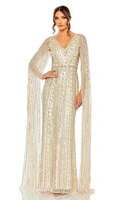 Long sequin formal dress with v-neckline and floor length cape Gown With Cape, Long Cape, Sequin Formal Dress, Sleeve Gown, Mac Duggal Dresses, Western Chic, Cape Sleeves, Mac Duggal, Gowns With Sleeves