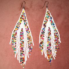 Approx 5" Handcrafted Multicolored With White Stripe Bohemian Dangle Earrings Boho Statement Jewelry Most Of My Other Earrings Are Dangle Types (Like These) That Can Be Upgraded To Solid Sterling Silver Or 14k Gold Filled Wires. I Have Some Extra Stainless Steel Wires And Gold Tone Wires Too. If You Want To Switch Out The Wires To One Of Those I Will Customize Them For You For Free. I Have A Background In Jewelry Design In Nyc And I Buy My Ear Wires From A Legitimate Metal Source Jewelry Supplie White Chandelier Earrings For Festival, White Beaded Earrings With Colorful Beads, Colorful Beaded White Chandelier Earrings, White Dangle Beaded Earrings, White Chandelier Earrings With Dangling Beads For Festivals, White Drop Earrings With Colorful Beads, Handmade White Chandelier Earrings For Festivals, White Beaded Earrings For Beach, White Large Round Beaded Earrings