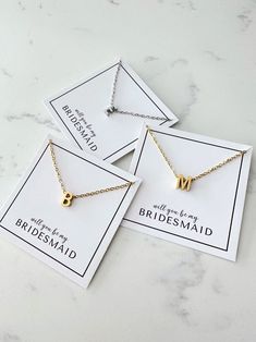 Personalized bridesmaid initial necklaces ready to gift. Each item is specially hand stamped and personalized to offer a variety of meaning and love to your pieces. All materials are made of stainless steel. How to Order Step 1 - Select the colour and length of your bridesmaid necklace Step 2 - Select the initial for the necklace EXTENSION CHAIN ADD-ON: ADJUSTABLE BY ADDITIONAL 5cm https://www.etsy.com/ca/listing/943133645/add-on-extension-chain-adjustable-by-an?ref=shop_home_active_40&frs=1&crt Valentine's Day Wedding Silver Initial Necklace, Dainty Custom Name Necklaces For Wedding, Gold Hand Stamped Charm Necklaces For Wedding, Dainty Silver Initial Necklace For Wedding, Elegant Personalized Charm Necklace For Bridesmaids, Elegant Custom Name Necklaces For Bridesmaid Gift, Minimalist Name Necklace For Wedding On Valentine's Day, Minimalist Name Necklace For Valentine's Day Wedding, Custom Name Silver Necklace For Bridesmaid Gift