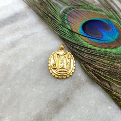 18K Gold Pendant of Indian God Shiva * Gold Pendant Necklace Finding * 18k Gold Charm * Charm Pendant Bead DIY Jewellery Findings * KC1511 Thank you for visiting our shop! Please Check Out Our Solid 18k solid Gold pendant handmade charm of Indian God Shiva / Shiv / Shivling selection for the best handmade, unique items for your jewelry. Country of Manufacture:India Theme:Religious Metal:Gold Size: 26X18 MM Metal Purity:18K Color: Yellow Item Number: KC1511 This gorgeous product belongs to our 18 Round 22k Gold Temple Necklace As Gift, Yellow Gold Round Pendant For Puja, Gold Locket Temple Necklace For Weddings, Gold Temple Necklace With Locket For Wedding, 22k Gold Temple Necklace As A Gift, Yellow Gold Temple Jewelry Locket, Yellow Gold Round Pendant Temple Necklace, Gold Plated Locket For Puja, 22k Gold Hallmarked Temple Necklace Pendant