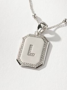 Sur 2.0 Necklace | Sterling Silver L | Product Detail Image | Uncommon James Silver Chain Necklace With Initial Pendant, Silver Pendant Initial Necklace With Delicate Chain, Silver Initial Pendant Chain Necklace, Trendy Silver Initial Pendant Necklace, Silver Charm Necklace With Rectangular Pendant And Initials, Silver Square Pendant Initial Necklace For Everyday, Silver Initial Necklace With Square Pendant For Everyday, Everyday Silver Initial Necklace With Square Pendant, Silver Initial Necklace With Rectangular Pendant