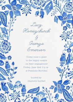 a wedding card with blue flowers and leaves on the front, in an ornate frame