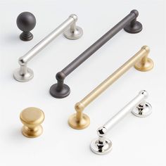 an assortment of door handles and knobs