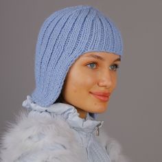 A wig hat, an adult bonnet is created for the most fashionable girls and women of this season. Unique design and style will make you irresistible. You will not go unnoticed in it. Handmade from premium yarn of natural composition. Wash at 30 oC. Squeeze without unscrewing the product. Dry on a smooth surface, shaping Trendy One-size Bonnet Cap, Winter Bonnet With Ear Flaps, One Size Fits Most, Adjustable Warm Bonnet, Warm Bonnet With Ear Flaps, Adjustable Warm Solid Color Bonnet, Winter Knitted Bonnet, Trendy Warm Bonnet Cap, Trendy Cold Weather Bonnet Cap, Fitted Knitted Brimmed Bonnet