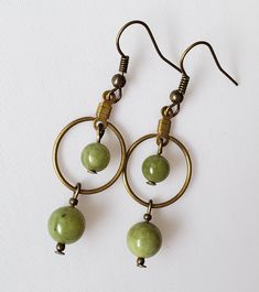 Bronze hoop earrings with your choice of clear crystal faceted accents, AB clear crystal accents or green stone accents. Ear hooks are nickel free! Trending Earrings, Wire Wrapped Jewelry Diy, Beaded Earrings Diy, Casual Earrings, Earrings Stone, Hoop Charms, Earring Trends, Wire Work Jewelry, Earrings Inspiration