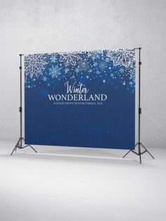 a blue winter wonderland backdrop with snowflakes