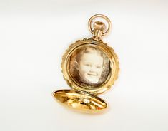 Victorian 14K Gold Watch Case Photo Keepsake Locket Pendant Gold Oval Watches For Gift, Gold Oval Watches As Gifts, Oval Gold Watches For Gifts, Timeless Watch With Gold Clasp As Gift, Vintage Yellow Gold Watches As Gifts, Classic Jewelry With Gold Clasp For Gift, Yellow Gold Oval Watch For Gift, Oval Yellow Gold Watch As Gift, Oval Yellow Gold Watches For Gifts