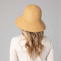 The perfect accessory for your sunny-weather wardrobe, the Oceanside Women's Ultrabraid Bucket with Side Seam is crafted from 100% wheat straw with a 4" brim for UPF 50+ sun protection. The adjustable, packable design comes in both black and natural colors, and features a side seam detail for a unique touch. Features: Colors: Black & NaturalMaterials: 75% Paper, 25% PolyesterBrim Size: 4" BrimSize: 57cmSun Protection: UPF 50+AdjustablePackable Adjustable Open Weave Sun Hat In Toquilla Straw, Lightweight Brimmed Straw Hat For Everyday, Everyday Lightweight Brimmed Straw Hat, Adjustable Short Brim Sun Hat With Open Weave, Adjustable Sun Hat With Open Weave And Short Brim, Adjustable Open Weave Spring Hat, Adjustable Open Weave Hat For Spring, Spring Straw Sun Hat With Open Weave, Casual Natural Braided Hat