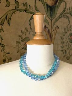 Blue Silce Crystal Beaded Necklace Measures 16' With a 2.5' Extender Finish Matte Gold 18KT Gold Plated Made In USA Style Number: DN178 Crystal Beaded Necklace, Crystal Bead Necklace, Matte Gold, Crystal Necklace, Crystal Beads, Made In Usa, Gold Plate, Beaded Necklace, Plating